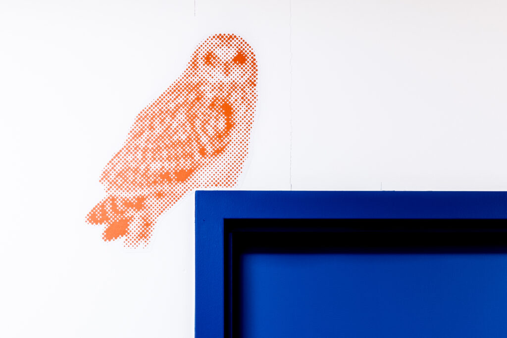 An owl decal at The Alex