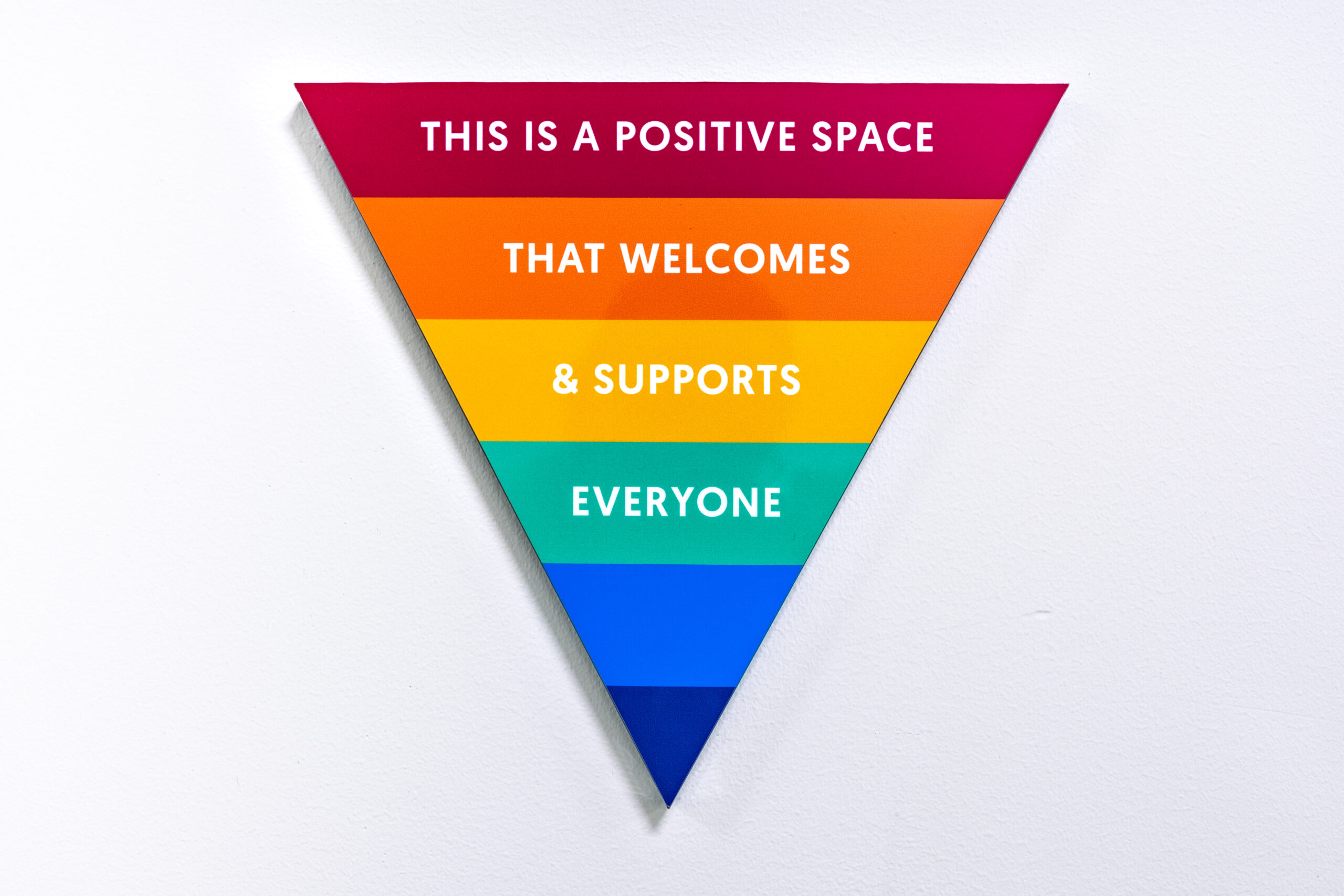 A sign at The Alex that reads: This is a positive space that welcomes and supports everyone.